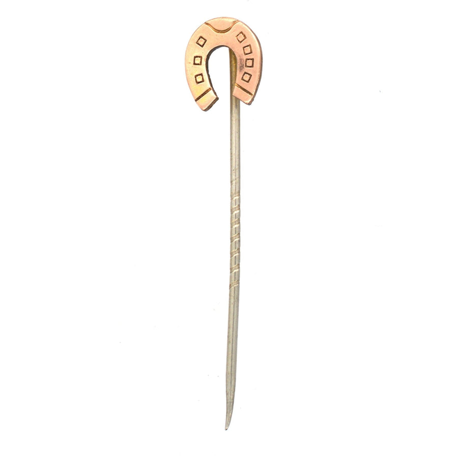 Edwardian 9ct gold lucky horseshoe tie pin symbolizing good luck and protection from evil.