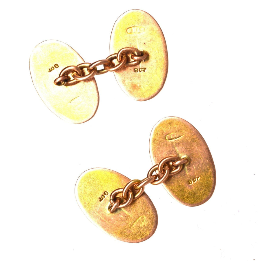Edwardian 9ct gold oval cufflinks with chain link, showcasing vintage design and craftsmanship from circa 1910s.