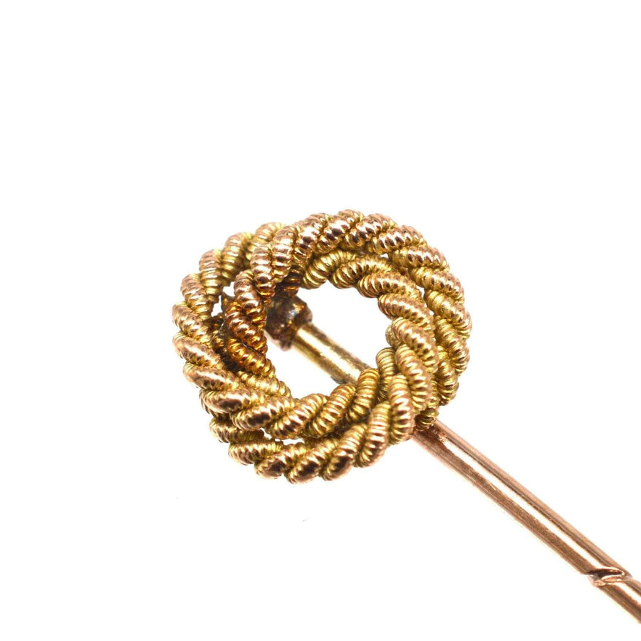 Edwardian 9ct gold round double knot rope tie pin symbolizing strength and commitment, ideal for ties or lapels.