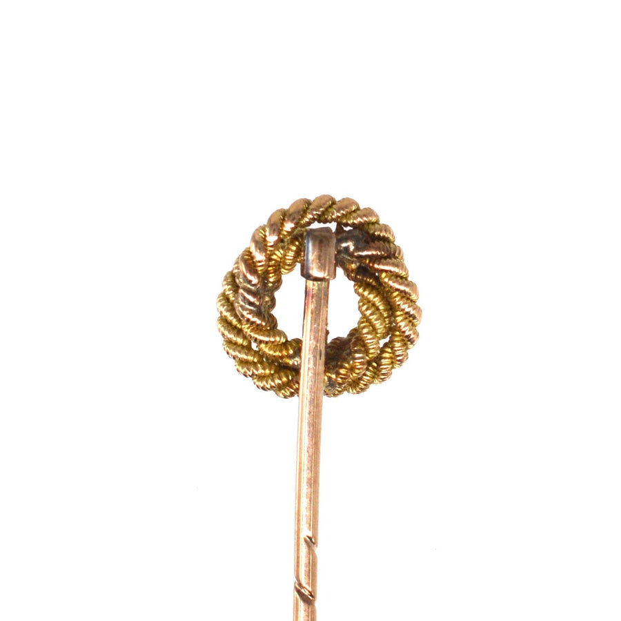 Edwardian 9ct gold round double knot rope tie pin symbolizing love and commitment, ideal for silk ties or lapels.