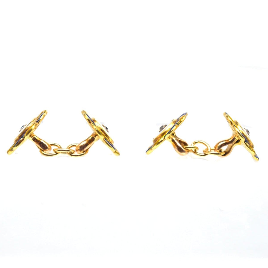 Edwardian cufflinks featuring mother of pearl, diamond, and blue and yellow enamel details, perfect for elegant attire.