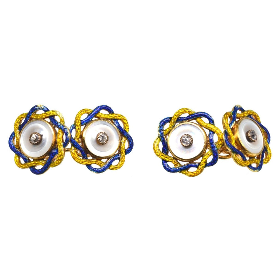 Edwardian cufflinks with mother of pearl, diamond center, and blue-yellow enamel gold rope design.