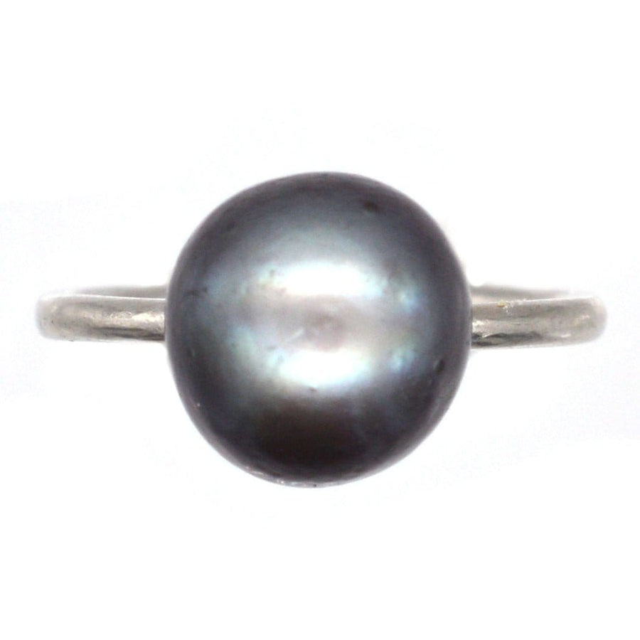 Edwardian platinum ring featuring a certified natural black saltwater pearl solitaire.
