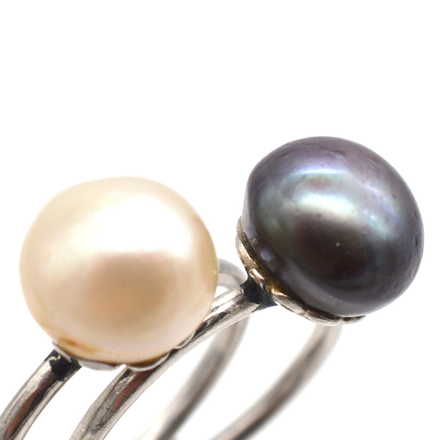 Edwardian ring featuring natural black saltwater pearl and white pearl, showcasing vintage elegance and fine craftsmanship.