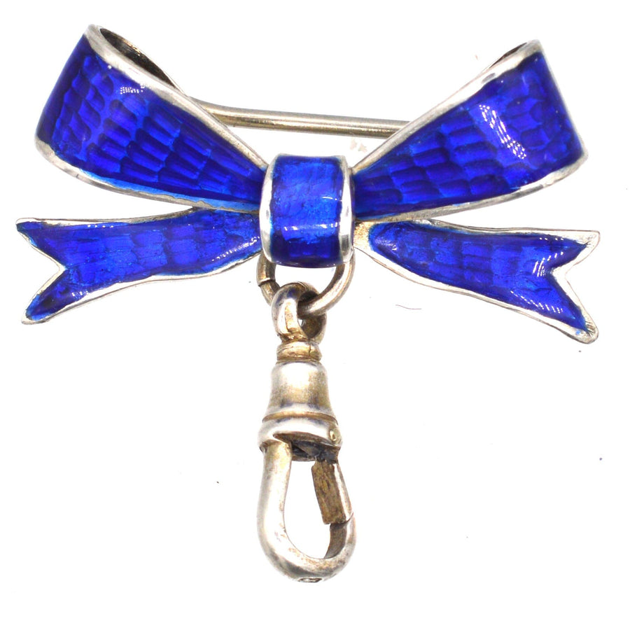 Edwardian Royal Blue Guilloché Enamel and Silver Bow Brooch with dog clip, assayed in Birmingham 1909.