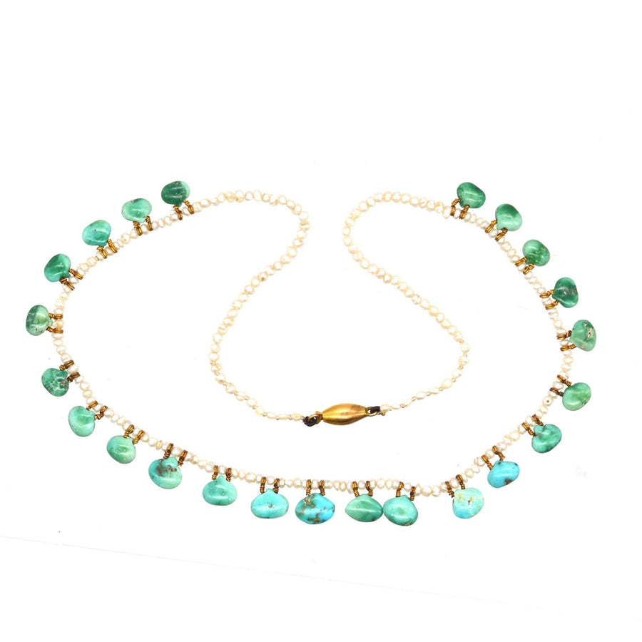 Edwardian turquoise and seed pearl necklace showcasing scallop-shaped turquoise, timeless elegance, and fine craftsmanship.