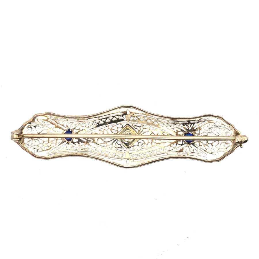 French Art Deco 14ct gold brooch with sapphire and diamond, featuring elegant white gold tracery design.