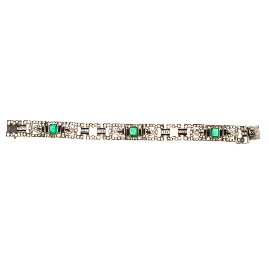 French Art Deco bracelet featuring emerald green and white diamond pastes, crafted with exquisite detail and vintage elegance.