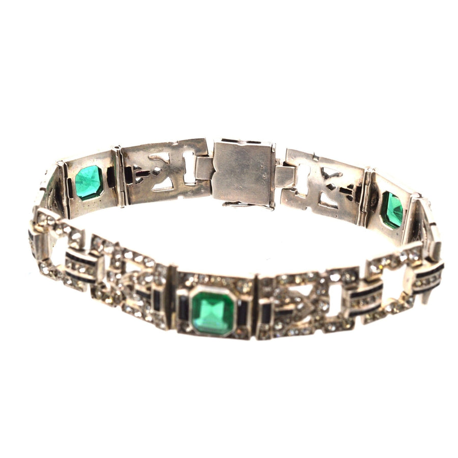 French Art Deco bracelet featuring emerald green Lazarus paste and sparkling diamond-like accents.