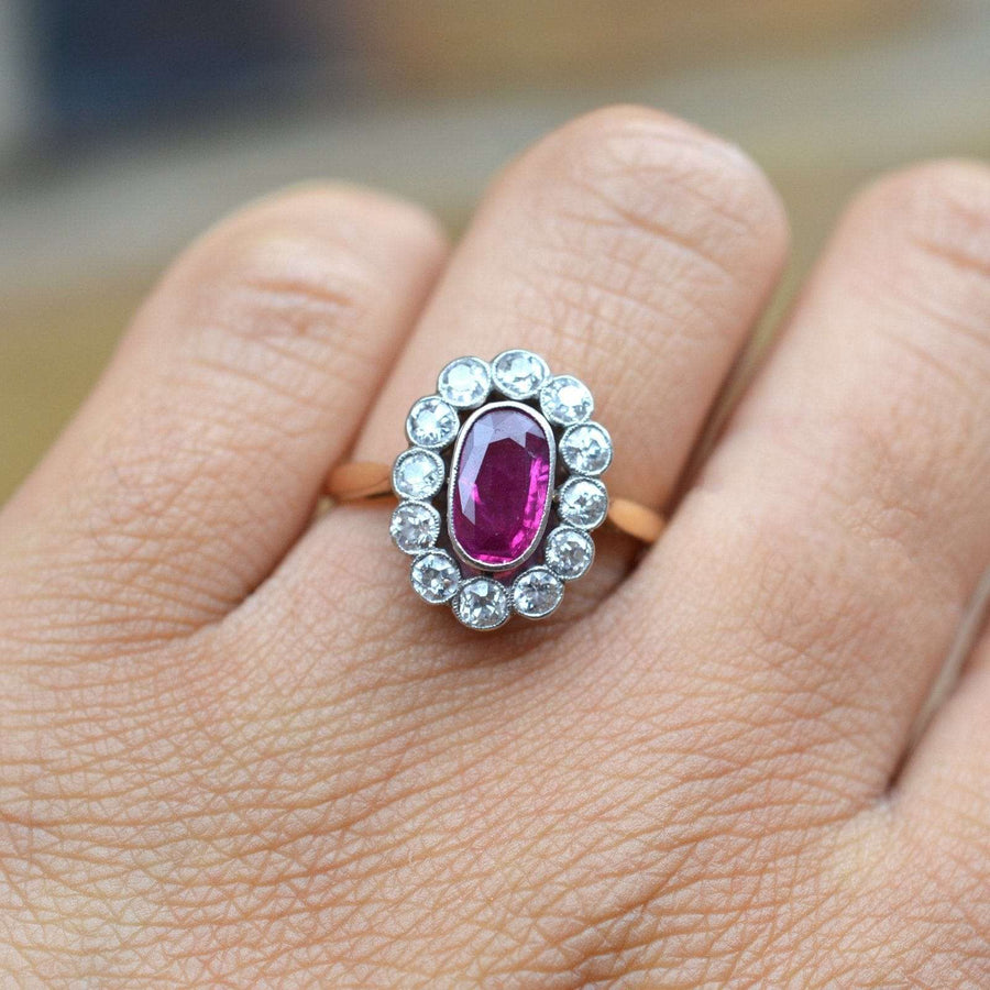 French Belle Epoque ruby and diamond cluster ring featuring an unheated Burma ruby, showcasing exquisite craftsmanship.