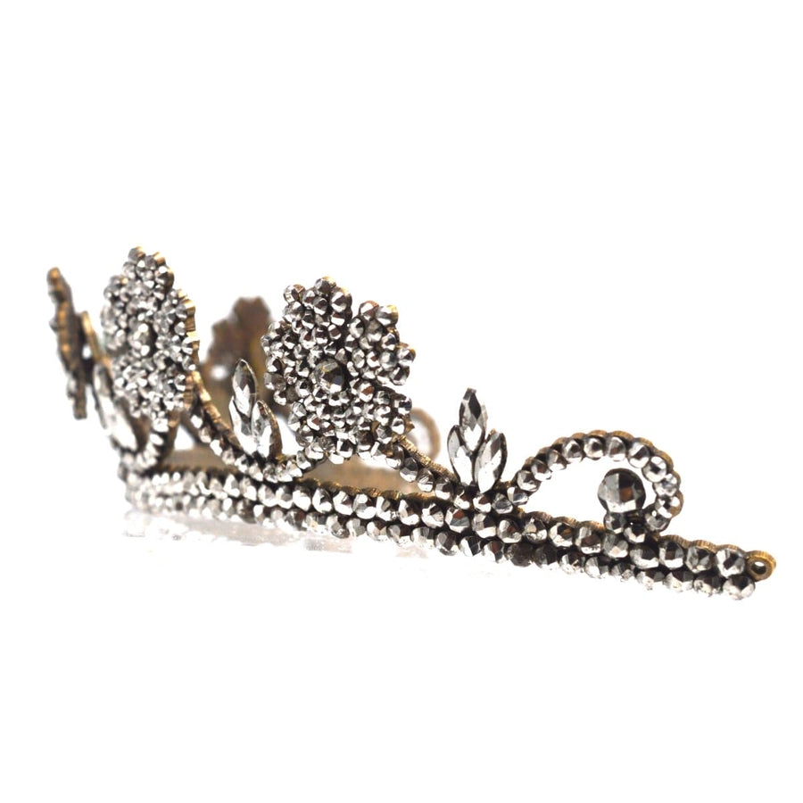 Georgian cut steel tiara featuring intricate wild rose blooms and a swagged design, embodying elegance and vintage craftsmanship.
