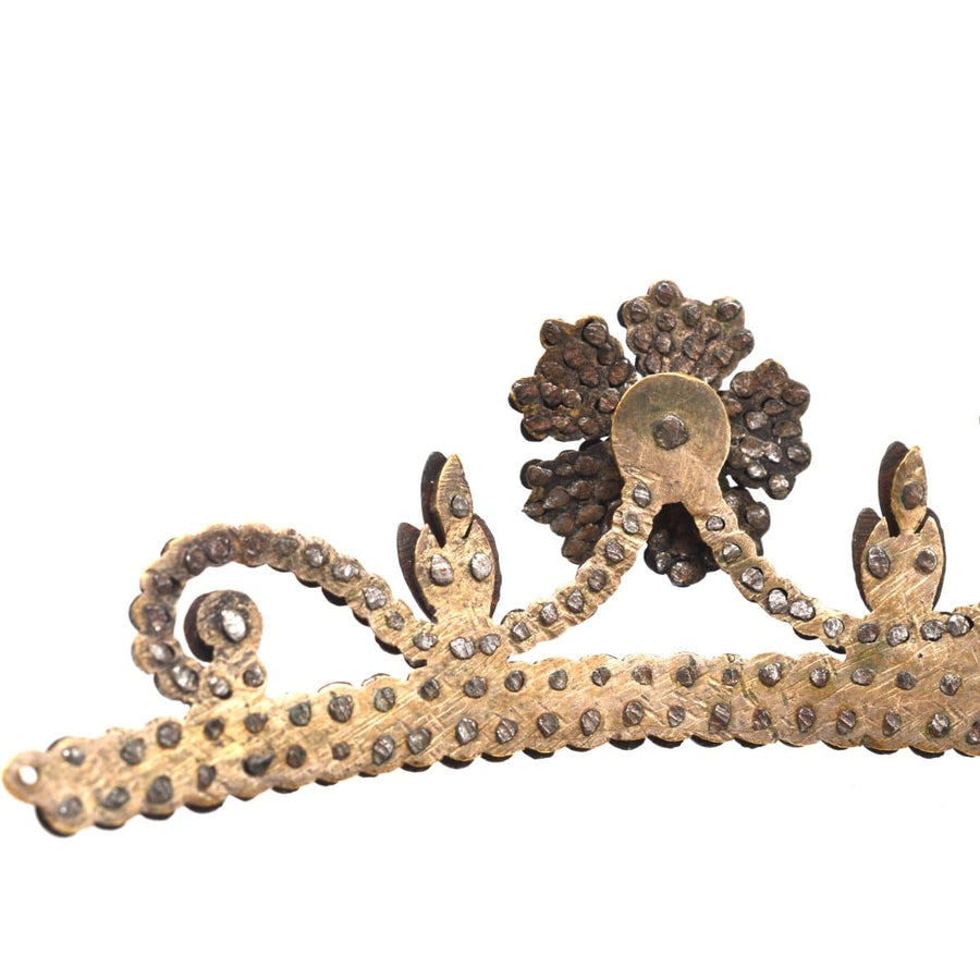 Georgian cut steel tiara featuring intricate wild rose motifs and delicate swags, a rare antique piece from the 19th century.