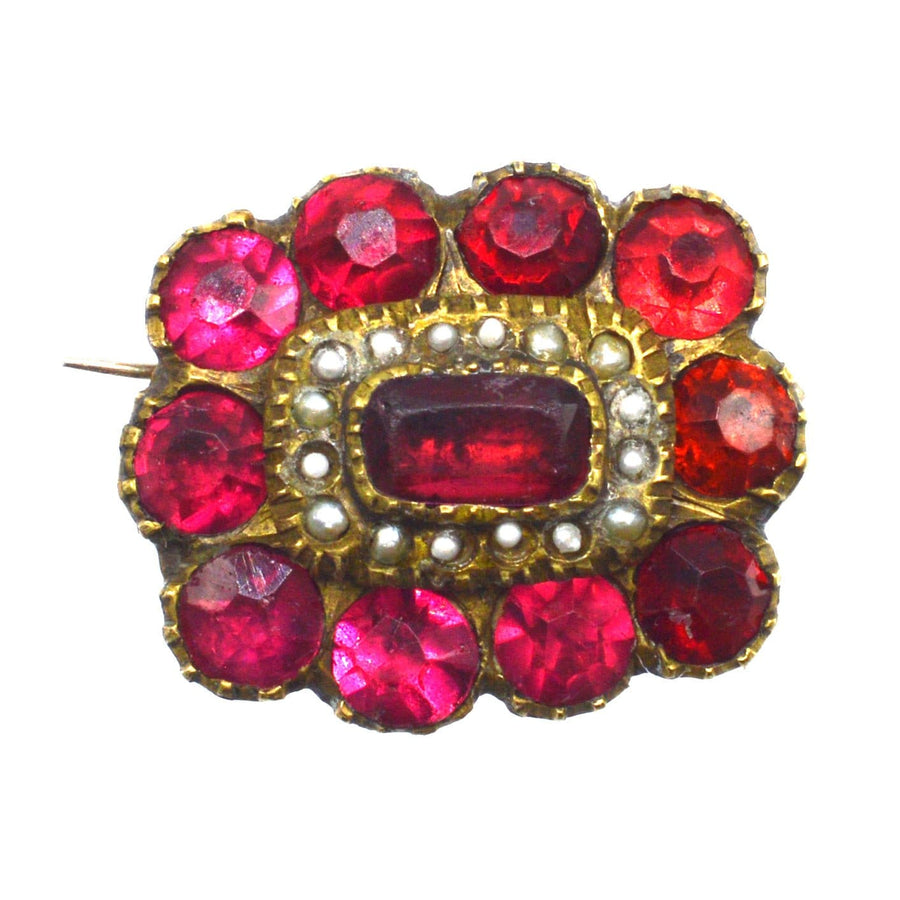 Georgian Red Paste 'Garnet' brooch with pearl cluster, showcasing vibrant red hues and vintage charm.