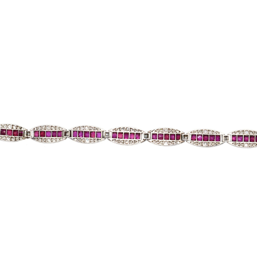 Antique 1910s bracelet featuring Burma rubies and diamonds set in gold and platinum, showcasing exquisite craftsmanship.