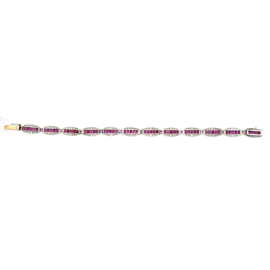 Antique 1910s 18ct gold and platinum bracelet with Burma rubies and old European cut diamonds.