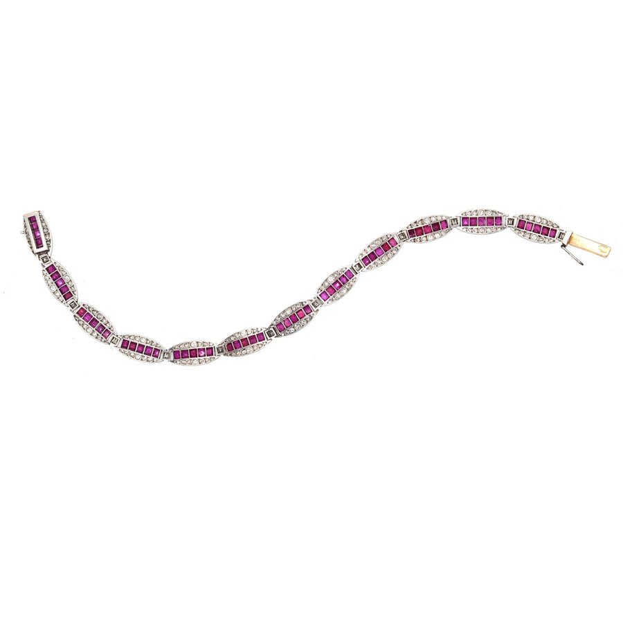 Antique 1910s 18ct gold and platinum bracelet with Burma rubies and old European cut diamonds.