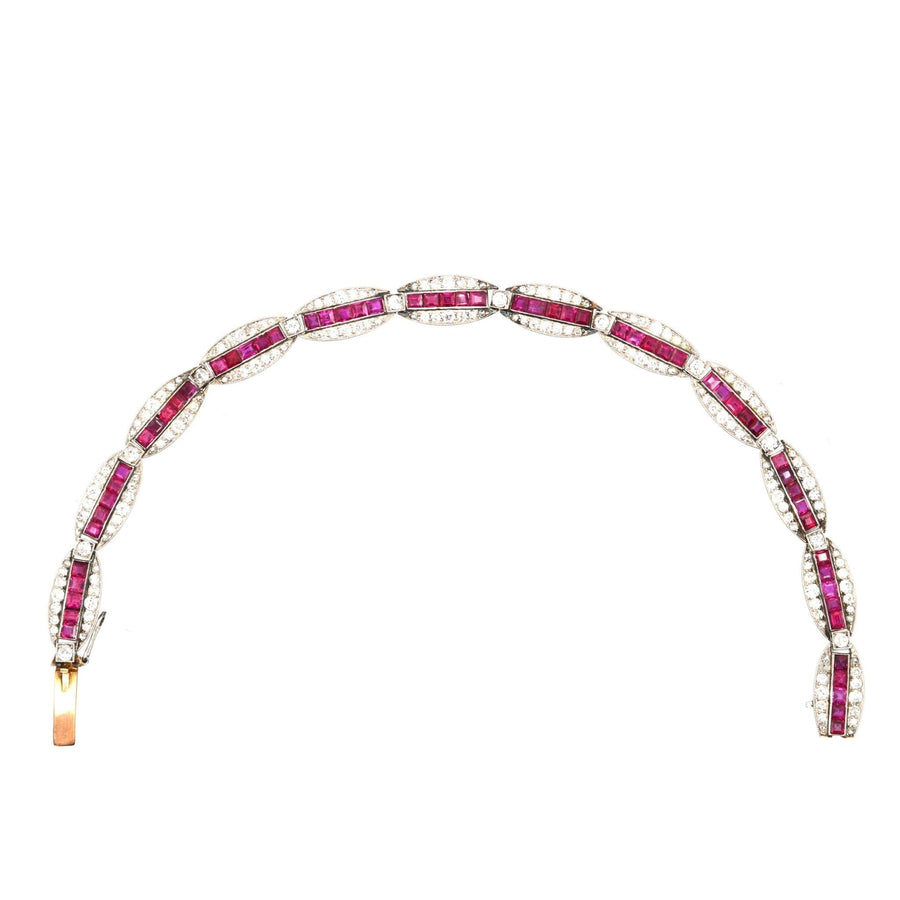 Antique Imperial Russian bracelet featuring Burma rubies and old European cut diamonds in gold and platinum settings.