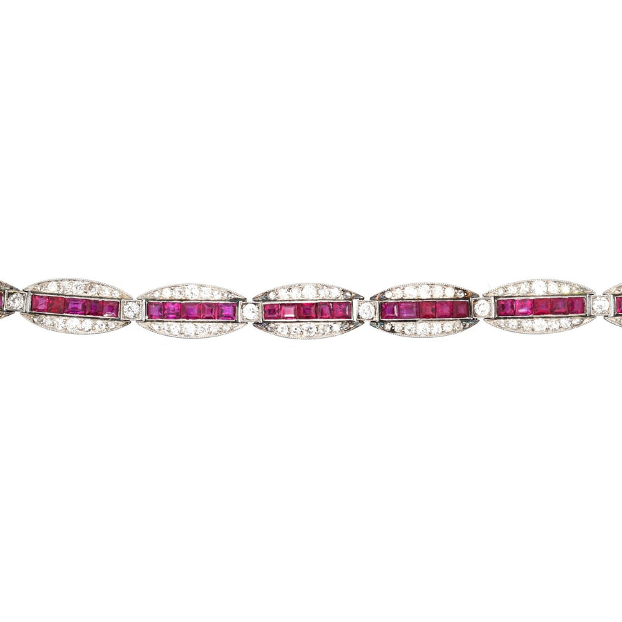 Antique 1910s Russian 18ct gold bracelet featuring Burma rubies and old European cut diamonds.