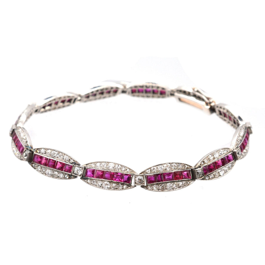 Antique 1910s gold and platinum bracelet with Burma rubies and old European cut diamonds.