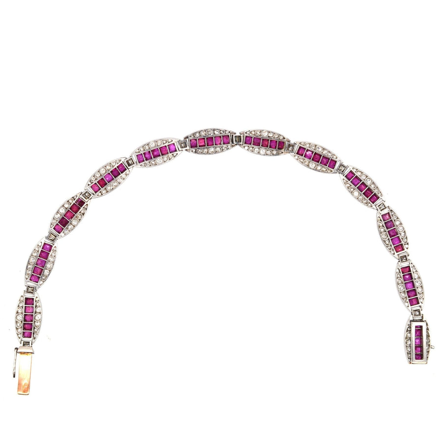 Antique 1910s bracelet featuring Burma rubies and Old European cut diamonds in gold and platinum setting.