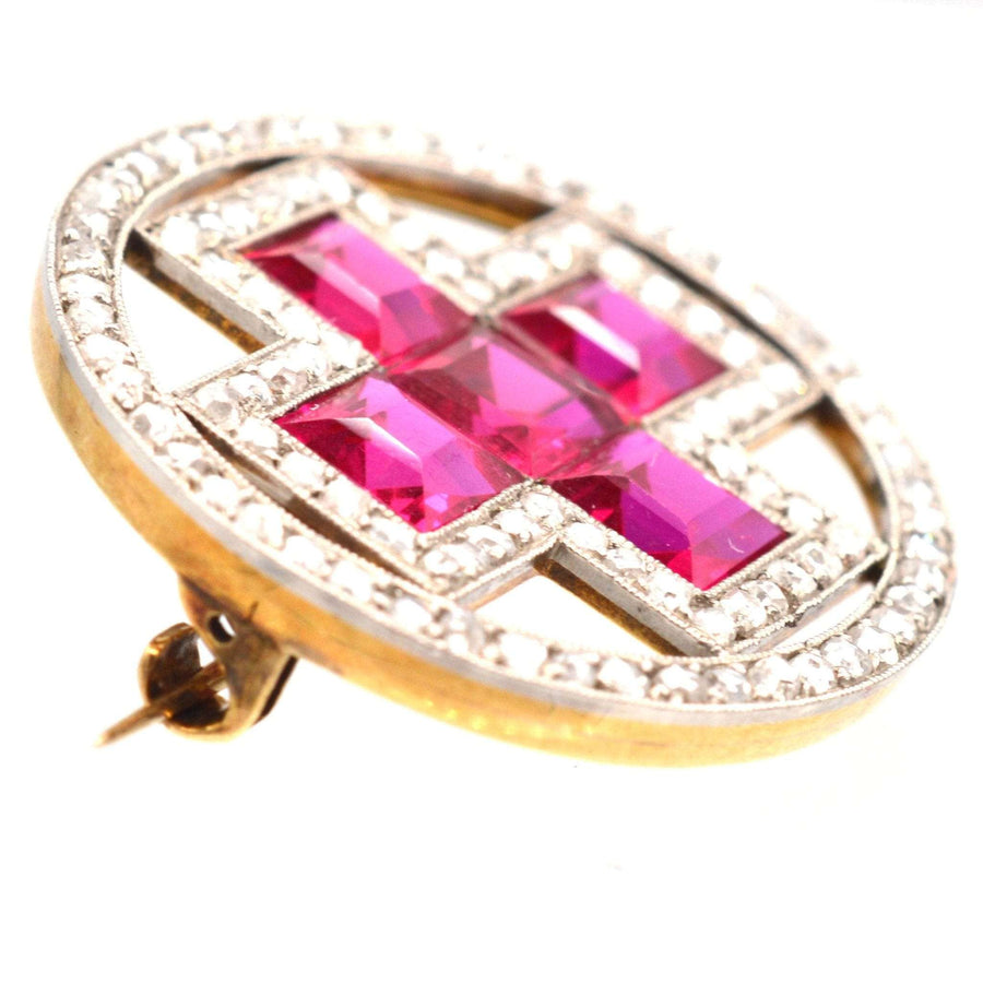 Imperial Russian brooch with synthetic ruby and diamond in red cross design, showcasing historical craftsmanship.