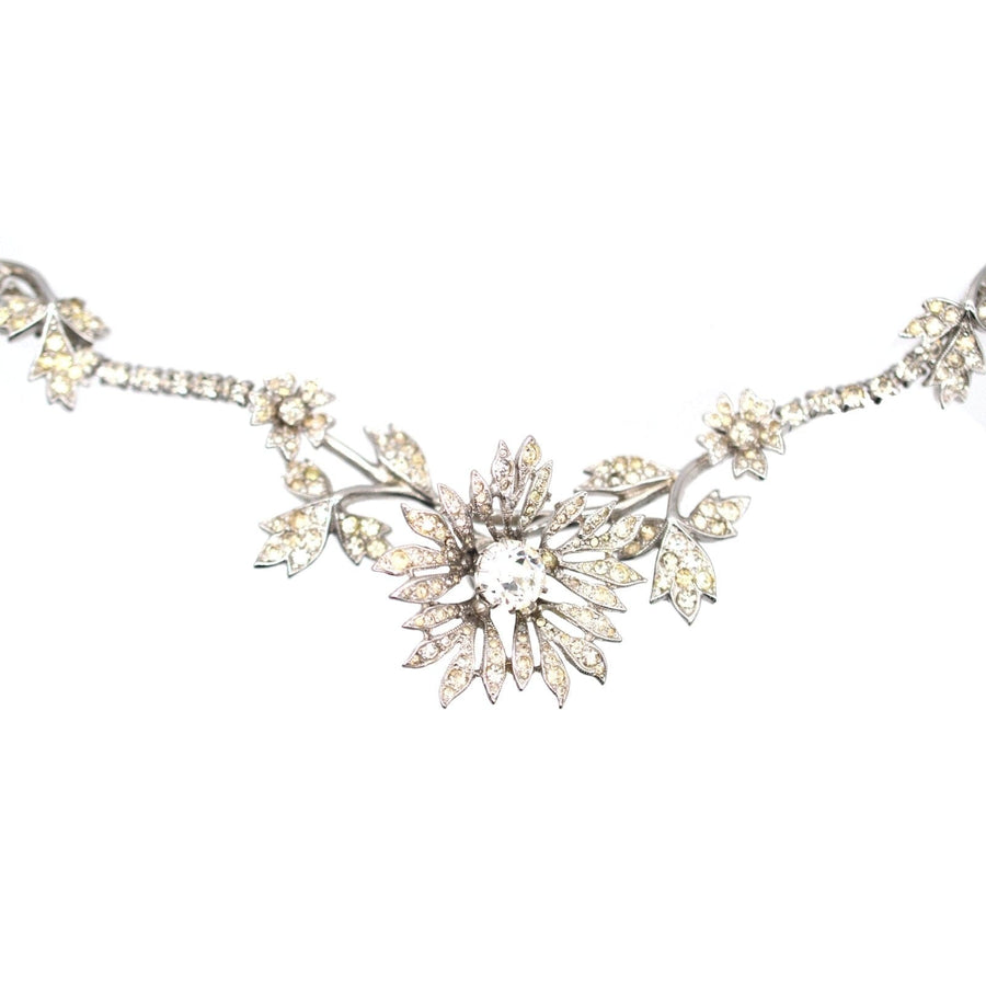 Vintage 1950s Kramer of New York rhinestone necklace with floral design and silver-tone accents