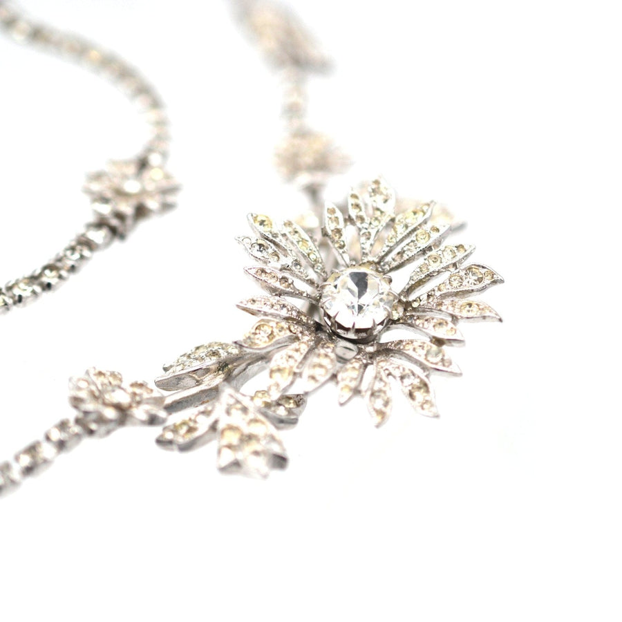 Vintage 1950s Kramer of New York en tremblant necklace with sparkling rhinestones and silver-tone design.