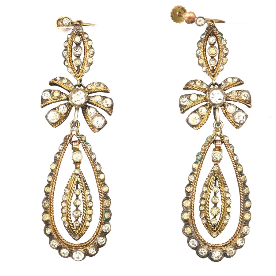 Large Art Deco silver and 9ct gold Portuguese style bow pendant earrings with paste stones, 1920s design.