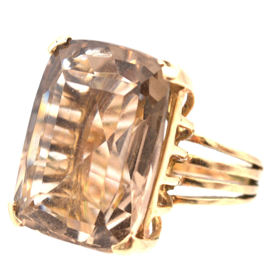 Large mid-century 9ct gold smoky quartz cocktail ring with an openwork shank showcasing a stunning gemstone.
