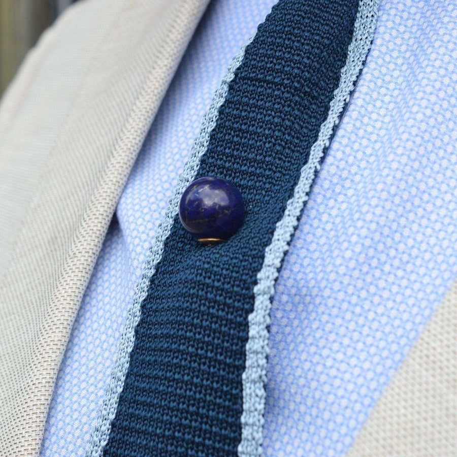 Large Victorian 18ct gold lapis lazuli sphere tie pin on a navy tie, perfect for formal occasions.