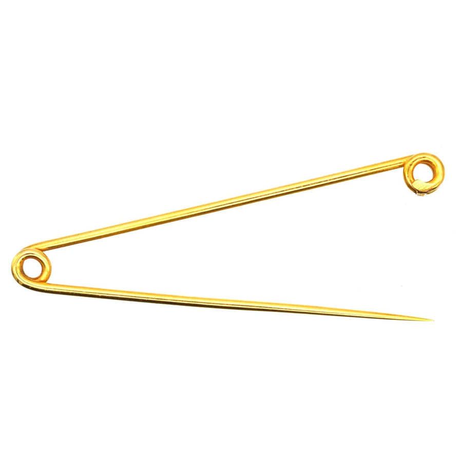 Large Victorian 9ct gold stock safety pin brooch, a fashion accessory with historical significance for riders.