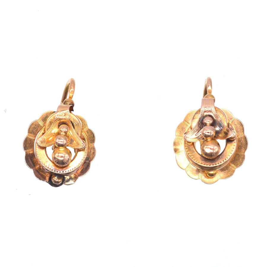 Antique 19th Century 18ct gold hoop earrings with intricate design and hinge back fitting.