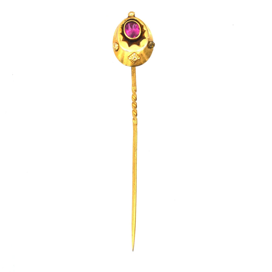 Late Victorian 15ct gold tie pin with red paste resembling a ruby, circa 1890-1900, elegant accessory for formal wear.