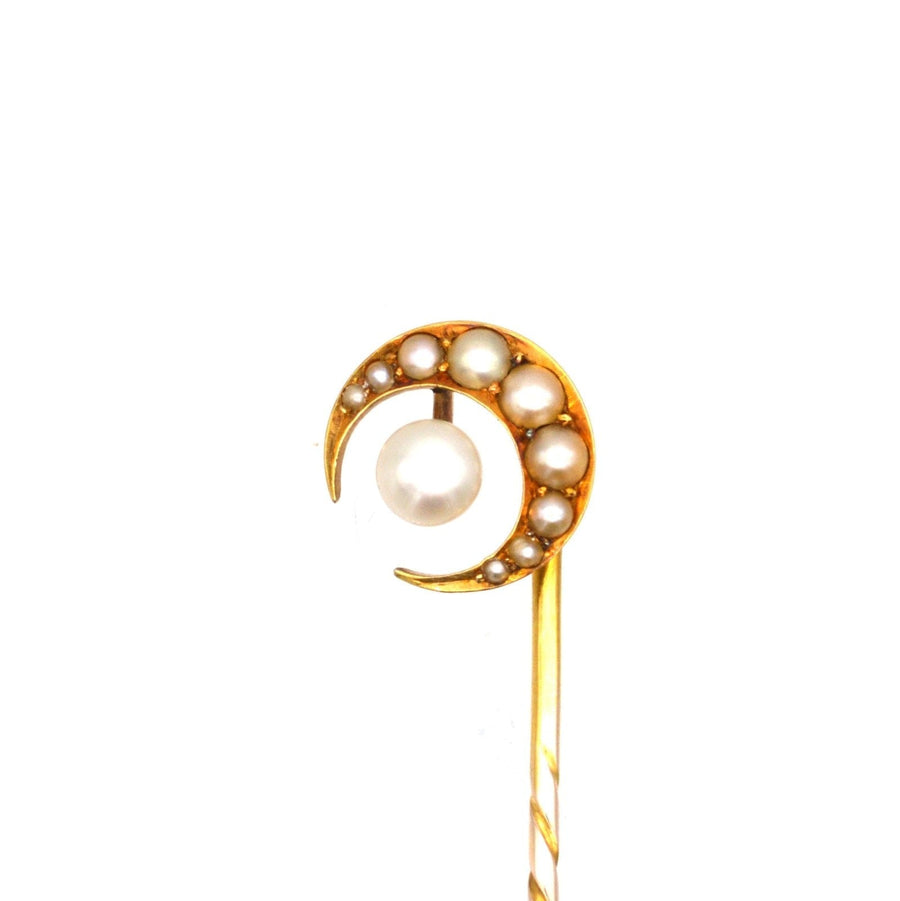 Late Victorian 15ct gold tie pin featuring a crescent moon design with split pearl accents.