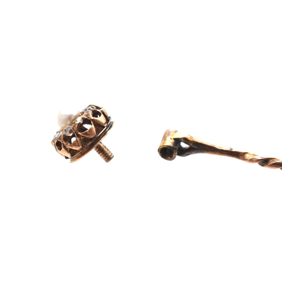 Late Victorian 15ct gold natural pearl and diamond cluster tie pin, showcasing exquisite craftsmanship and timeless elegance.