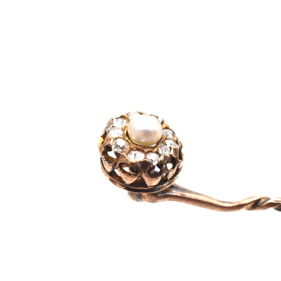 Late Victorian 15ct gold cluster tie pin featuring a natural pearl and diamond accents, ideal for elegant styling.