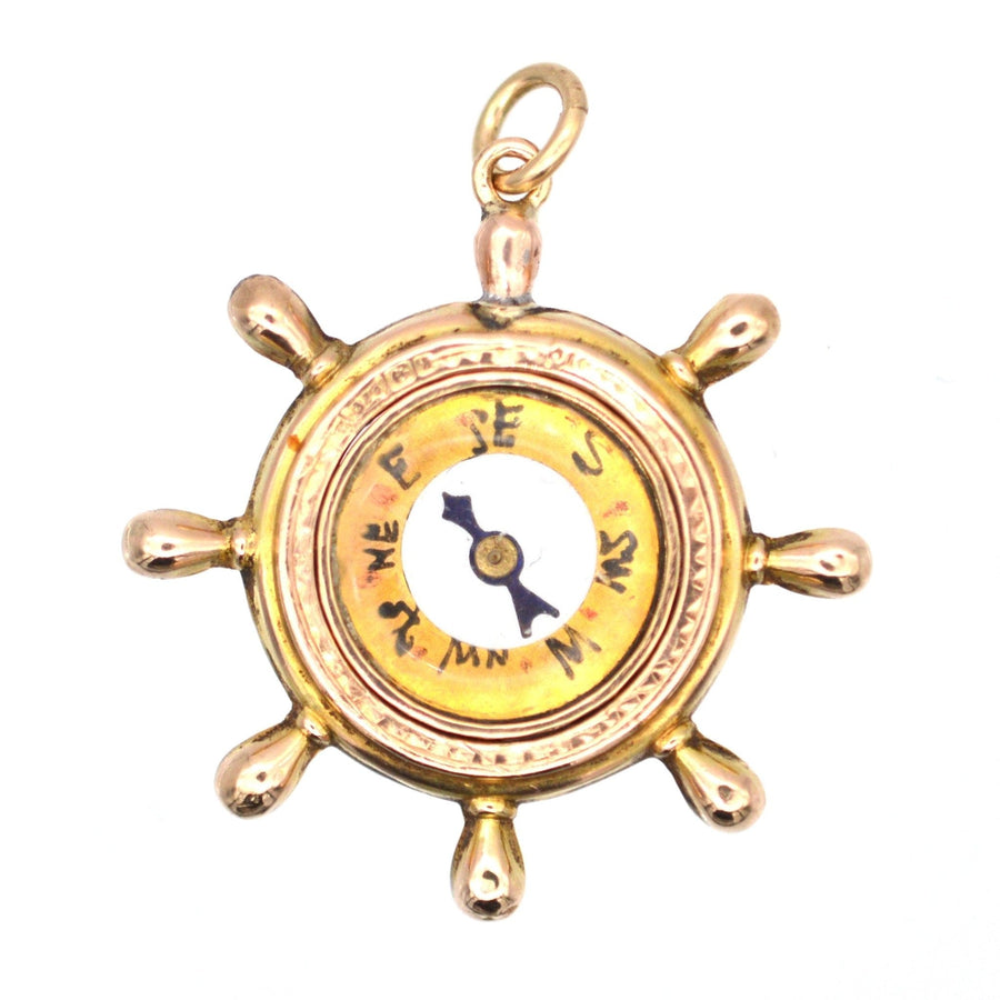 Late Victorian 9ct gold ship wheel compass pendant, assayed in Birmingham 1900, featuring maker's mark JC.