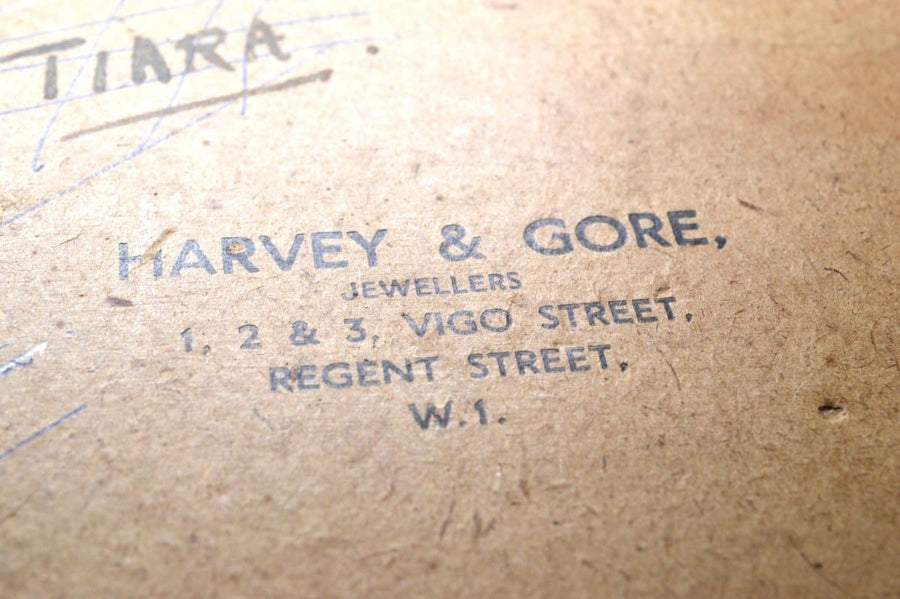 Label featuring 'Harvey & Gore, Jewellers, Vigo Street, Regent Street, W.I.' on tiara packaging.