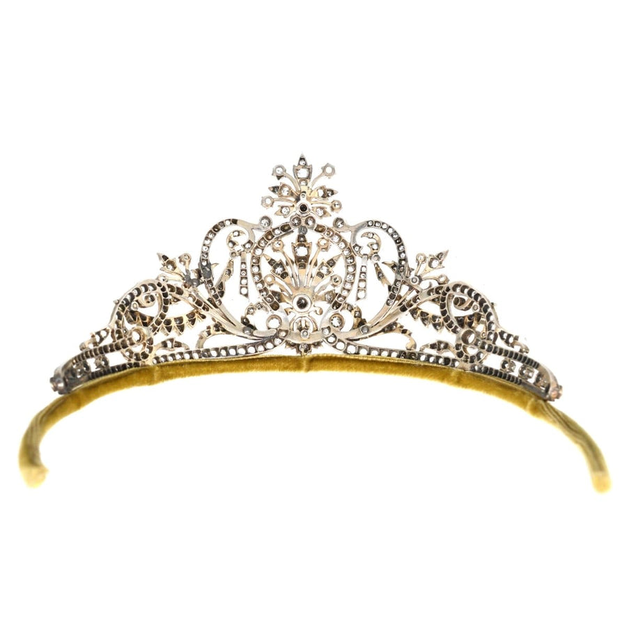 Late Victorian silver paste tiara, intricately designed with swags and floral sprays, dating from the 1860s-1880s.