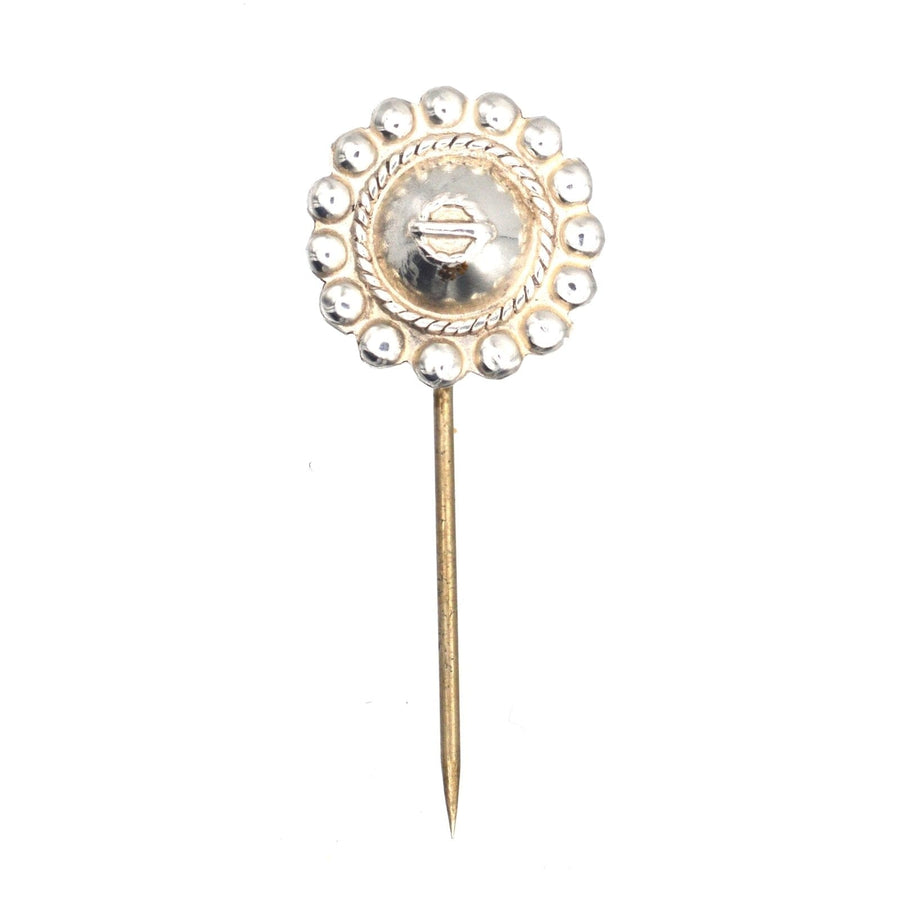 Late Victorian silver tie pin with floral design, ideal for colorful silk ties, includes a stopper for easy use.