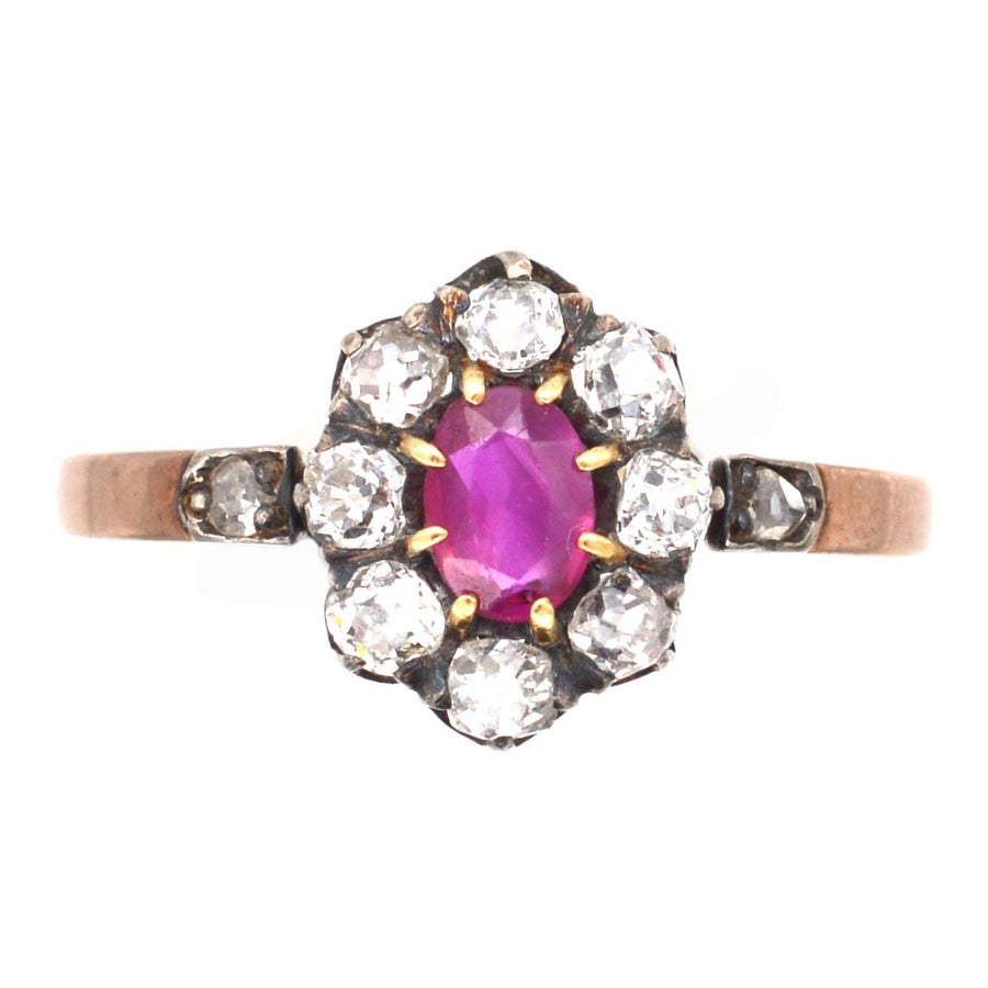 Late Victorian ruby and old mine cut diamond cluster ring in rose gold and silver.