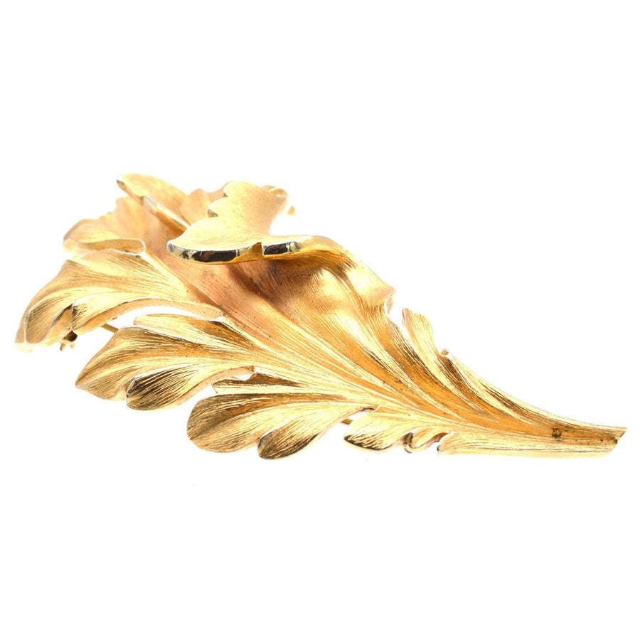 Mid Century Trifari large gilt metal leaf brooch, a dramatic statement piece of jewelry with intricate detailing.