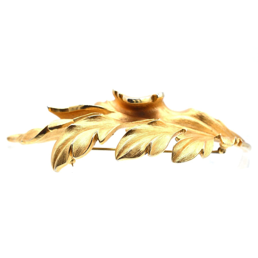 Mid Century Trifari large gilt metal leaf brooch, an eye-catching statement jewelry piece.