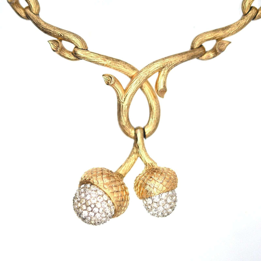 Mid-century gold-tone statement necklace with naturalistic oak branches and rhinestone-accented acorns by Trifari.