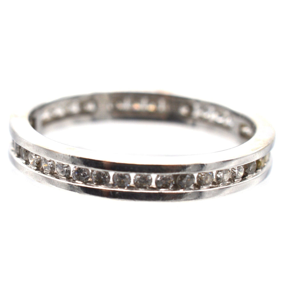 Elegant 18ct white gold diamond channel setting eternity ring, perfect for engagement or new mother gift.