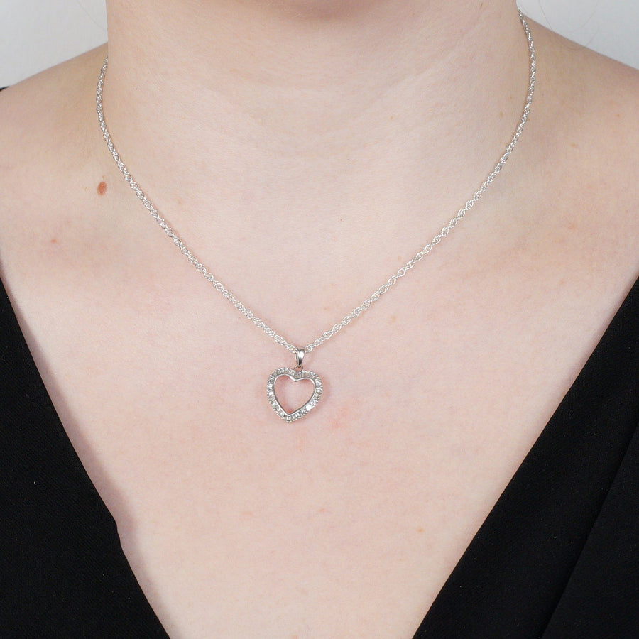 Modern 18ct white gold heart-shaped diamond pendant showcasing elegance, perfect for Valentine's Day gifts.