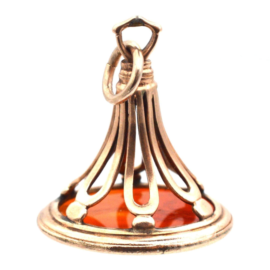 9ct gold vintage seal pendant featuring a carnelian intaglio of Greek goddess Daphne, showcasing intricate openwork design.