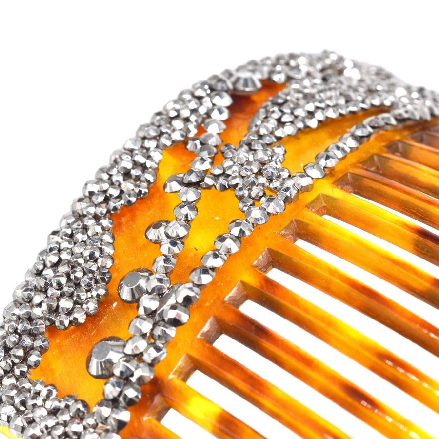 Regency tortoiseshell hair comb adorned with cut steel, featuring intricate design and elegant craftsmanship.