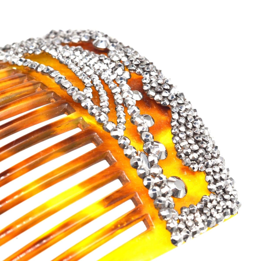 Regency tortoiseshell hair comb with cut steel embellishments, featuring a shooting star design.