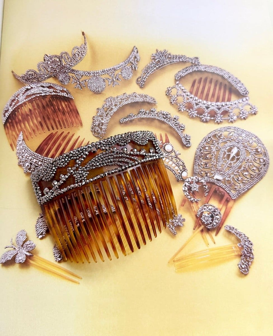 Collection of ornate hair combs made of tortoiseshell and embellished with intricate cut steel designs.
